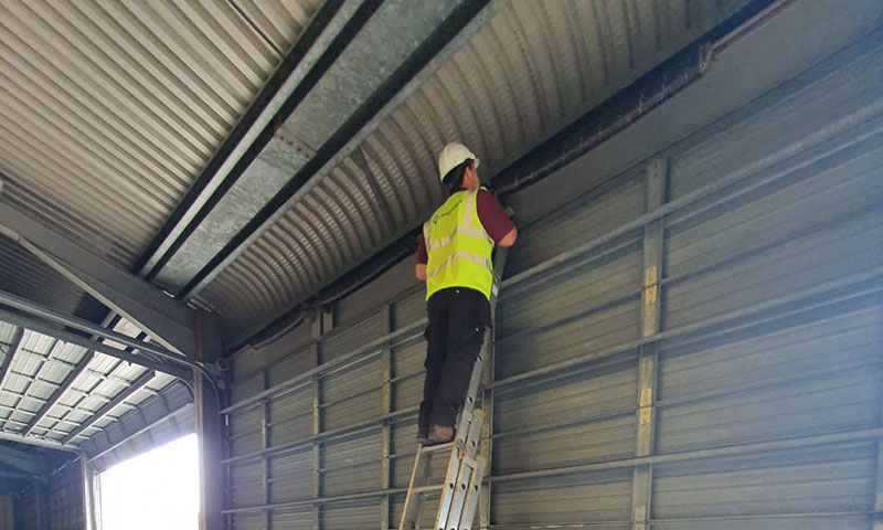 door repair 1 800x480 Industrial Doors Design & Installation 1 - PGE
